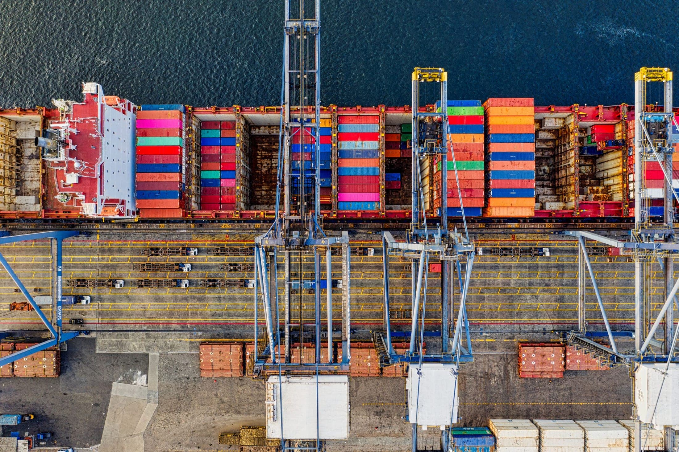 Container terminal photograph evoking a cross-border commercial environment
